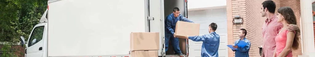 Movers carefully handling delicate items, showcasing the attention to detail in our moving services.